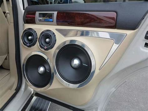 the interior of a car with speakers in it