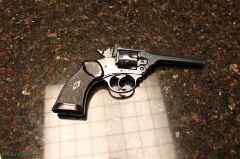 Gunlistings.org - Collectibles Functioning Webley Revolver. In Excellent Shape