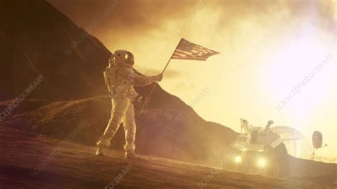 Astronaut waves US flag on Mars - Stock Video Clip - K010/6123 - Science Photo Library