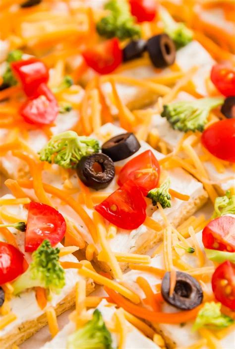Crescent Roll Veggie Pizza is a classic appetizer that is a fresh and delicious mainstay at any ...