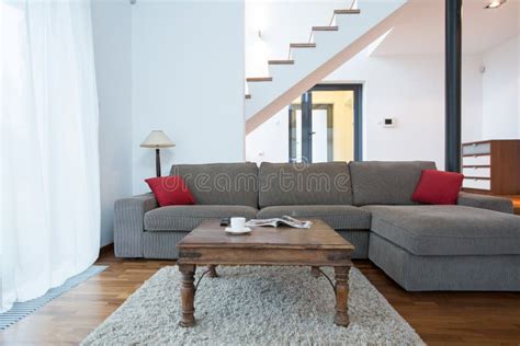 Large couch in living room stock photo. Image of loft - 50746444