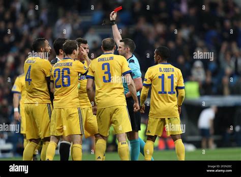 referee MICHAEL OLIVER shows a red card to GIANLUIGI BUFFON of Juventus ...