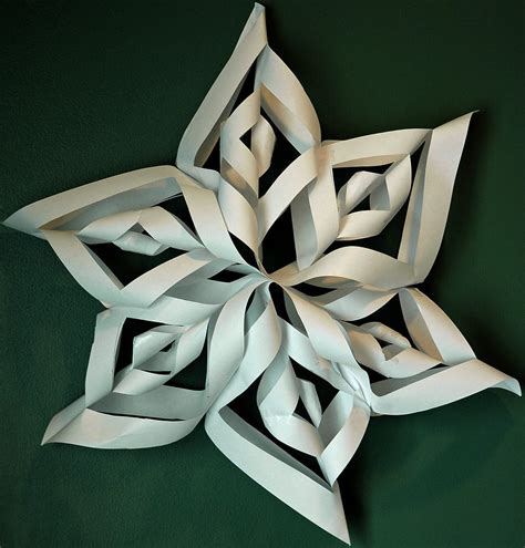 Twisted Paper Christmas Star Photograph by LeeAnn McLaneGoetz ...