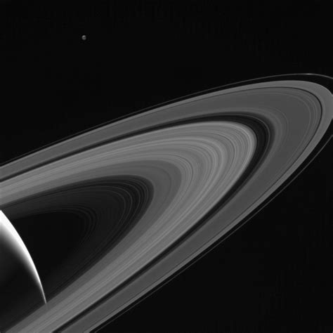 Saturn Moon Tethys Shines Above Rings in Gorgeous Photo | Space