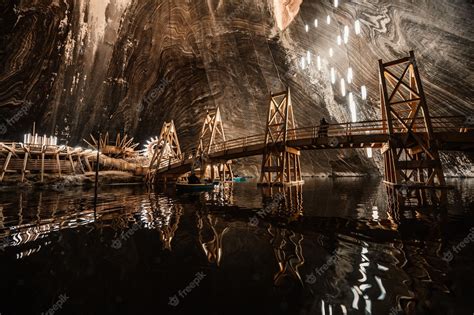 Premium Photo | Underground theme park in big salt mine Salina Turda Turda in Romania ...