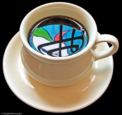 Reflections in a coffee cup | This is the colored glasses of… | Flickr