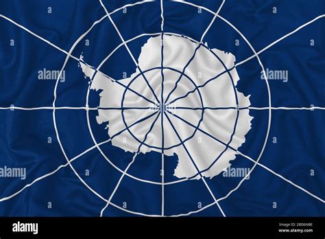 Antarctic Treaty flag on wavy silk textile fabric background Stock ...