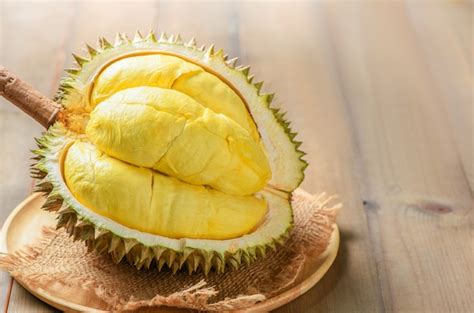 Premium Photo | Durian or durio zibthinus murray on wood plate. king of fruits of thailand in ...