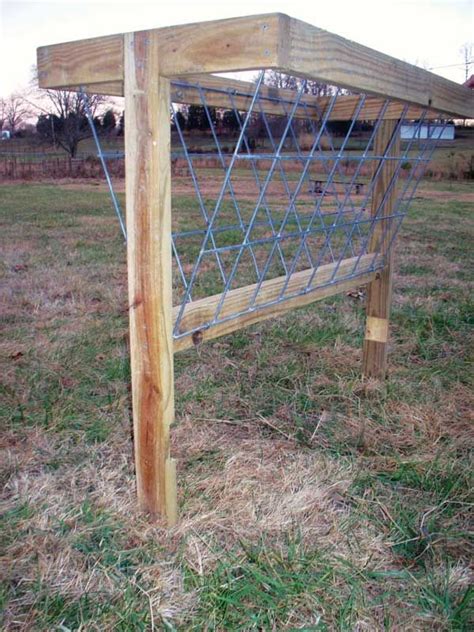 How to build a hay feeder in 17 simple steps, and for under $100! | Goat barn, Diy hay feeder ...