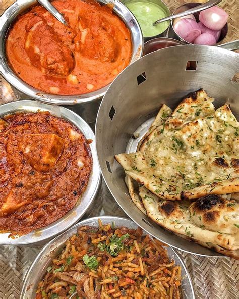 Butter Chaap, kadhai paneer, masala pulao, garlic naan and condiments ...