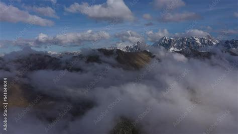 Aerial drone view of mountains above fog clouds Stock Video | Adobe Stock