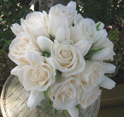 White tulip and rose bouquet | Bridal bouquet flowers, Wedding flowers tulips, White rose bouquet