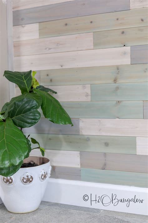 DIY Multi Colored Wood Plank Wall | Wood plank walls, Plank walls, Wood planks diy