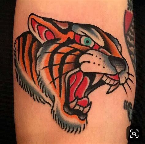 12+ Traditional Tiger Head Tattoo Designs and Ideas | PetPress Traditional Tattoo Animals ...