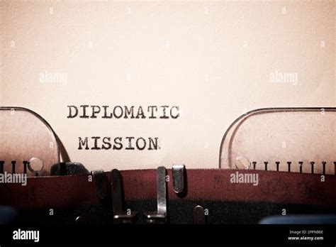 Diplomatic mission text written with a typewriter Stock Photo - Alamy