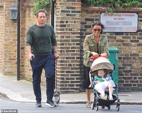 Christine Lampard enjoys a family stroll with husband Frank and their ...