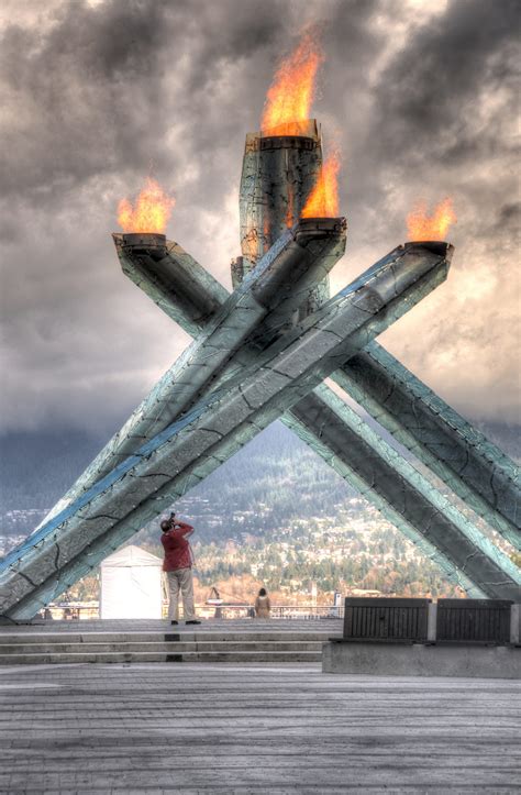 Man Photographing the Olympic Cauldron - Duncan.co