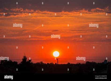 Cloudy sunset sky Stock Photo - Alamy