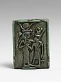 Faience amulet plaque of Isis nourishing a pharaoh | Egyptian | Third Intermediate Period | The Met
