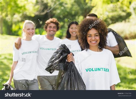 Team Young Volunteers Picking Litter Park Stock Photo 177567785 ...