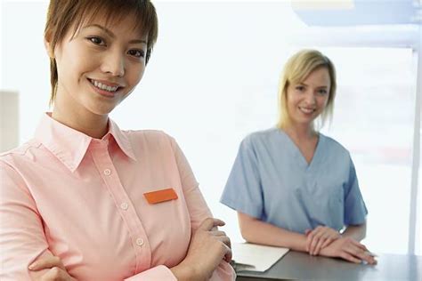 Royalty Free Medical Receptionist Uniforms Pictures, Images and Stock ...