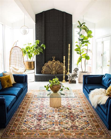 Boho Eclectic Living Room Using a rug in a space totally transforms it ...