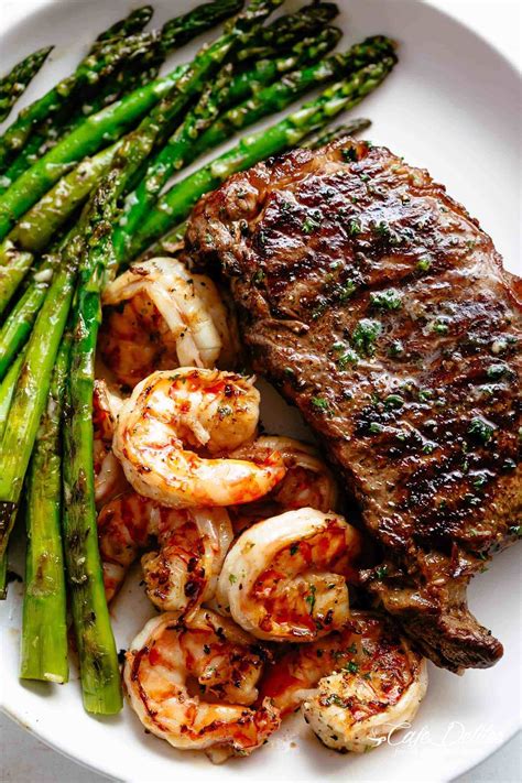 Steak & Shrimp slathered in garlic butter makes for the BEST steak recipe! | cafedelites.com ...