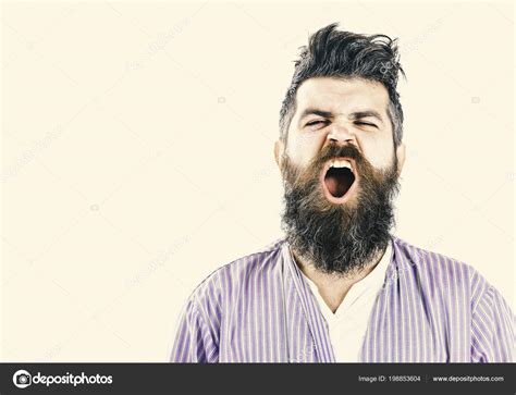 Man with yawning sleepy face on white background. — Stock Photo ...