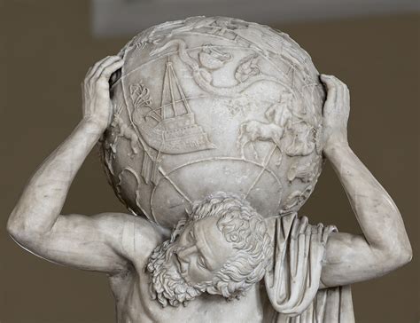 Statue of Atlas holding the celestial sphere (Farnese Atlas): a close-up. Naples, National ...