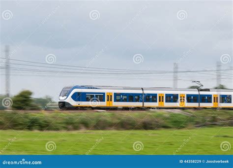 Train Moving Fast in Landscape Stock Image - Image of cargo, electric: 44358229