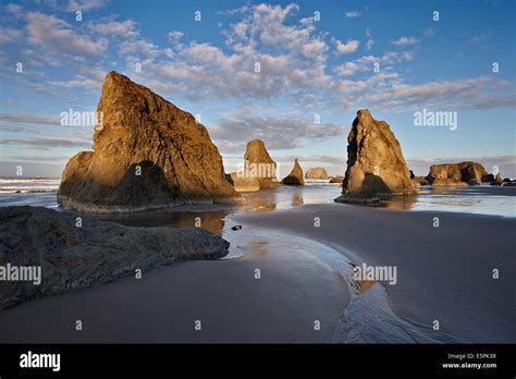 Sea stacks and clouds, Bandon Beach, Oregon, United States of America, North America Stock Photo ...