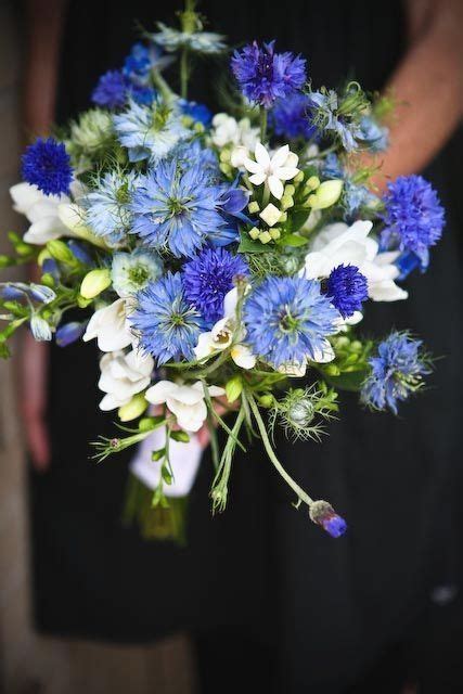 Blue and white wildflower wedding bouquet. Perfect for bride or bridesmaid. Designed using blue ...