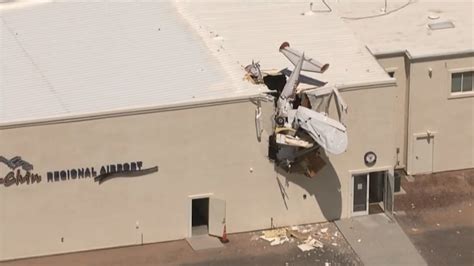 Plane crashes into building at Arizona airport, injuring two | KSNV