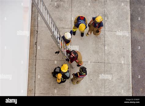 Firefighter Ladder Rescue Stock Photos & Firefighter Ladder Rescue ...