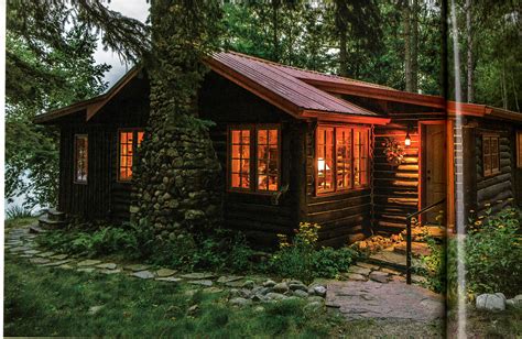 We like this color scheme with the red metal roof, darker wood and ...