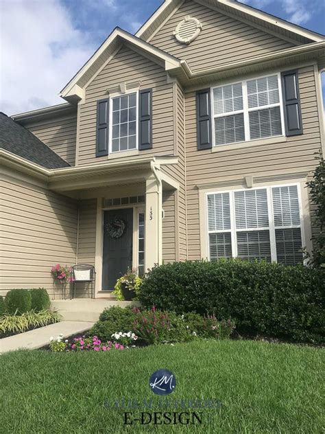 Beige or tan siding with cream trim and Benjamin Moore Temptation shutters, front door. Kylie M ...