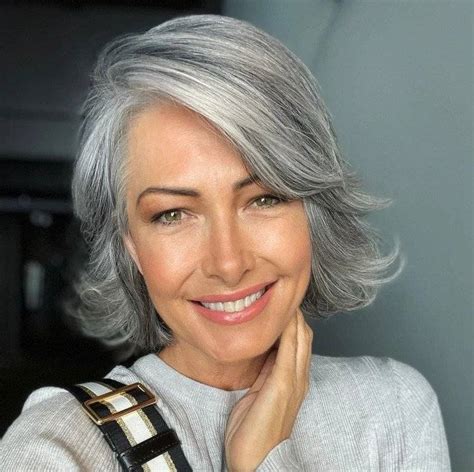 Medium length hairstyles: Layered haircuts with bangs for women over 50 that make you look 10 ...