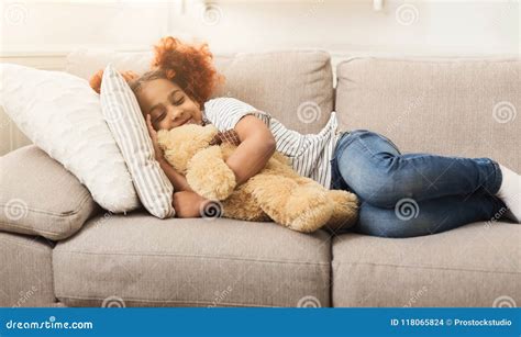 Little Happy African-american Girl Sleeping on Couch at Home Stock Photo - Image of rest, person ...