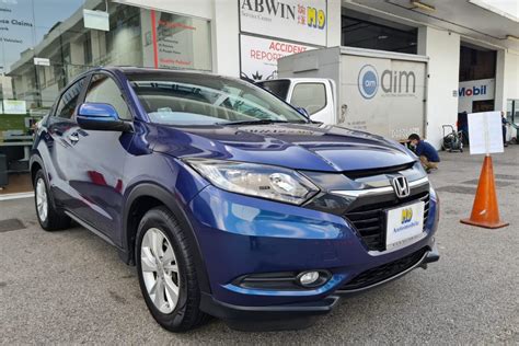 pre-owned Blue Honda Vezel 1.5A X - M9 International Pte Ltd