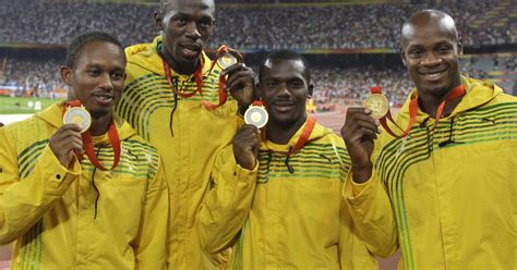 Usain Bolt is stripped of 2008 Olympic relay gold in teammate's doping ...