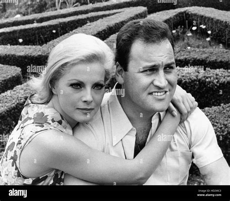 Virna Lisi (left0 with husband Franco Pesci, 1966 Stock Photo - Alamy