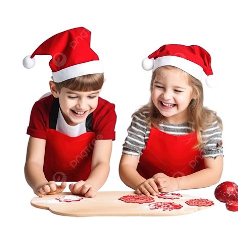 Brother And Sister In Red Caps Are Having Fun And Preparing Christmas Cookies At A White Table ...