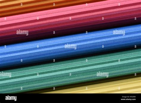 Corrugated colorful paper roll Stock Photo - Alamy