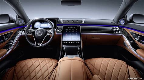 the interior of a car with brown leather and blue trims, including an ...