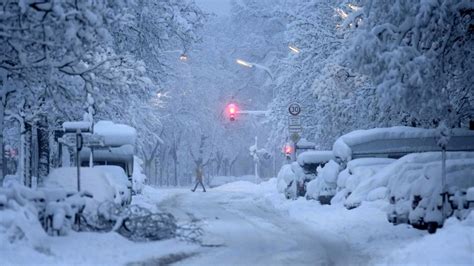 All flights grounded at Munich airport after snowstorm in Germany | AP News