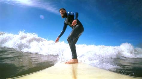 Surfing in Llangennith Beach in Wales. This spot is has great waves and beautiful views... If ...