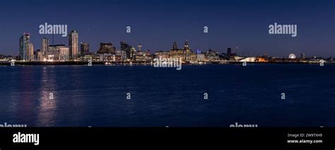 Panorama of Liverpool waterfront skyline at night Stock Photo - Alamy