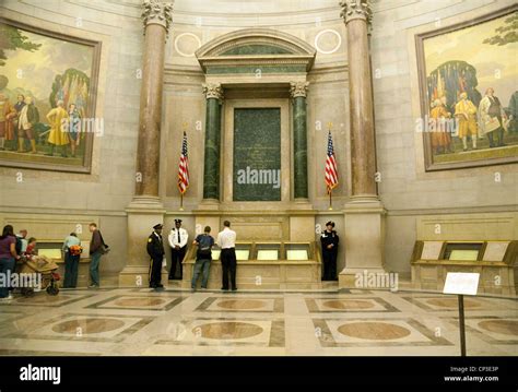 People viewing documents in the Rotunda, the National Archives ...