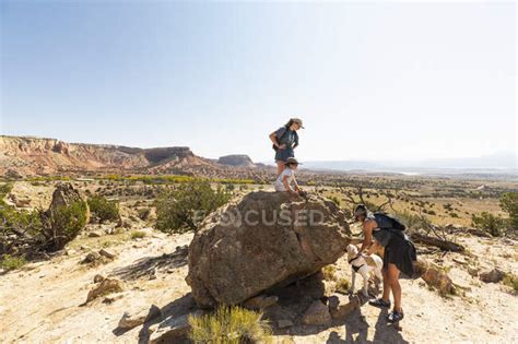 Family hiking at Ghost Ranch, New Mexico — landscape, mother - Stock Photo | #426942574