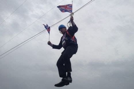 Boris Johnson gets stuck on a zip-line at Victoria Park London 2012 ...